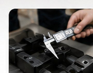 Dimensional check with digital calipers during inspection